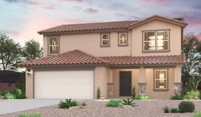 Two-story stucco house with a red tile roof, double garage, and desert landscaping with rocks and cacti, set against a dusk sky with scattered clouds.