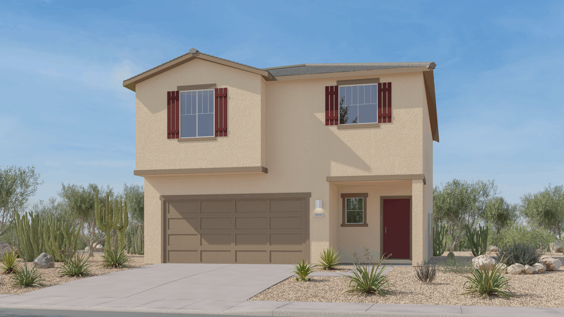 A two-story beige house with red shutters, a double garage, a red front door, and xeriscape landscaping featuring desert plants and rocks under a clear blue sky.