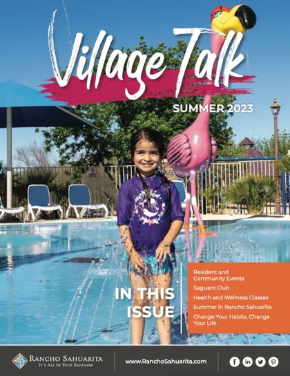 A young girl in a purple swim shirt stands smiling at the edge of a pool with a pink flamingo float nearby. Behind her are pool chairs, umbrellas, and trees. Text reads "Village Talk Summer 2023.