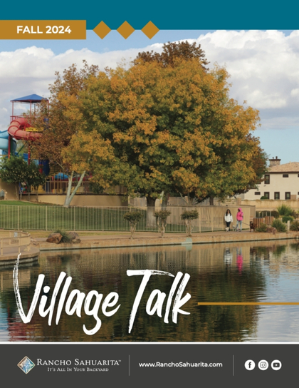 Cover of "Village Talk" Fall 2024. A tree with autumn leaves stands by a pond, with two people walking nearby. A playground and houses are visible in the background. Rancho Sahuarita branding and website are at the bottom.