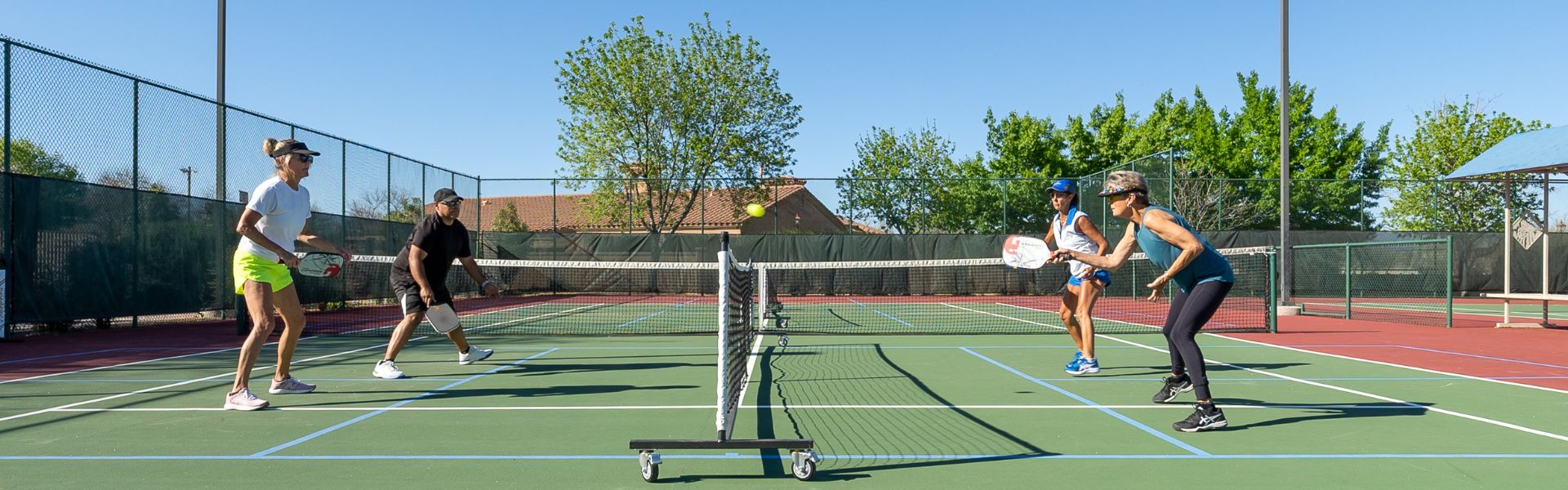People playing pickleball