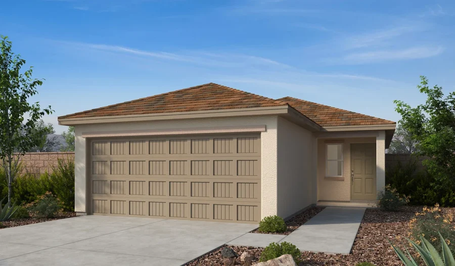 Single-story house with a two-car garage, light tan exterior, brown shingle roof, concrete driveway, and xeriscaped front yard with rocks and desert plants under a blue sky.
