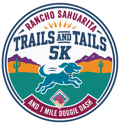 Circular logo for Rancho Sahuarita Trails and Tails 5K and 1 Mile Doggie Dash, featuring a running dog, sun, mountains, cacti, and event text.